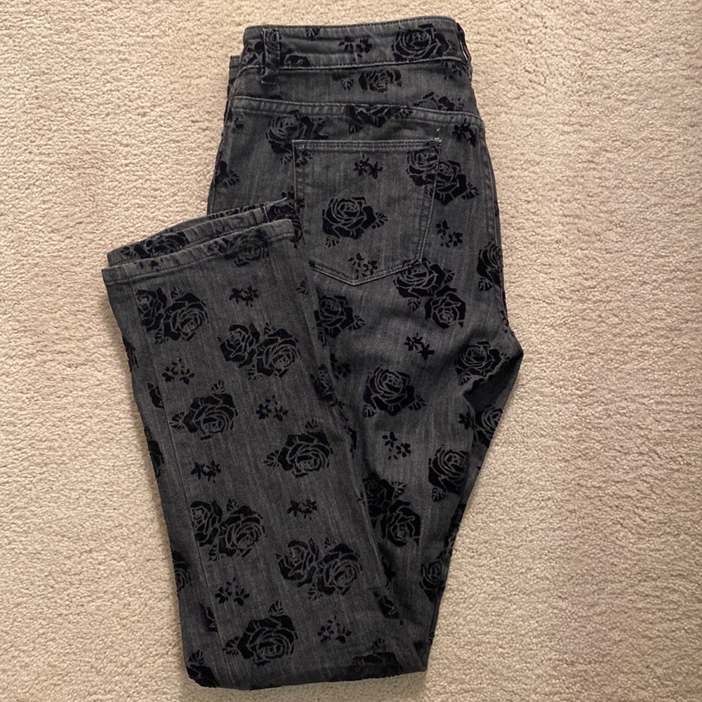 Chico’s Black denim jeans with a velvet rose embellishment throughout. Size 1.5